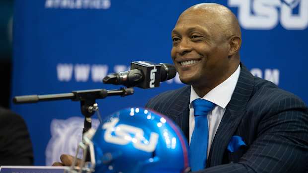 Former NFL and Tennessee Titans running back Eddie George smiles as he listens to media questions as he is announced as the new head football coach for Tennessee State University at the Gentry Center Tuesday, April 13, 2021 in Nashville, Tenn.